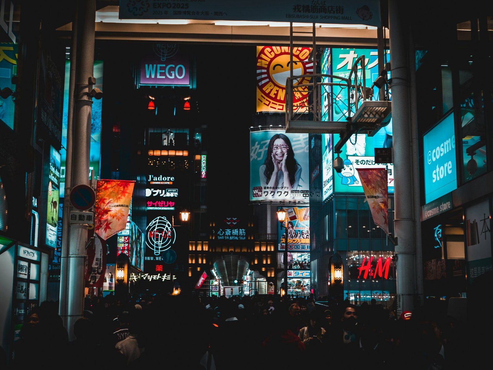 people walking on streets at nighttime